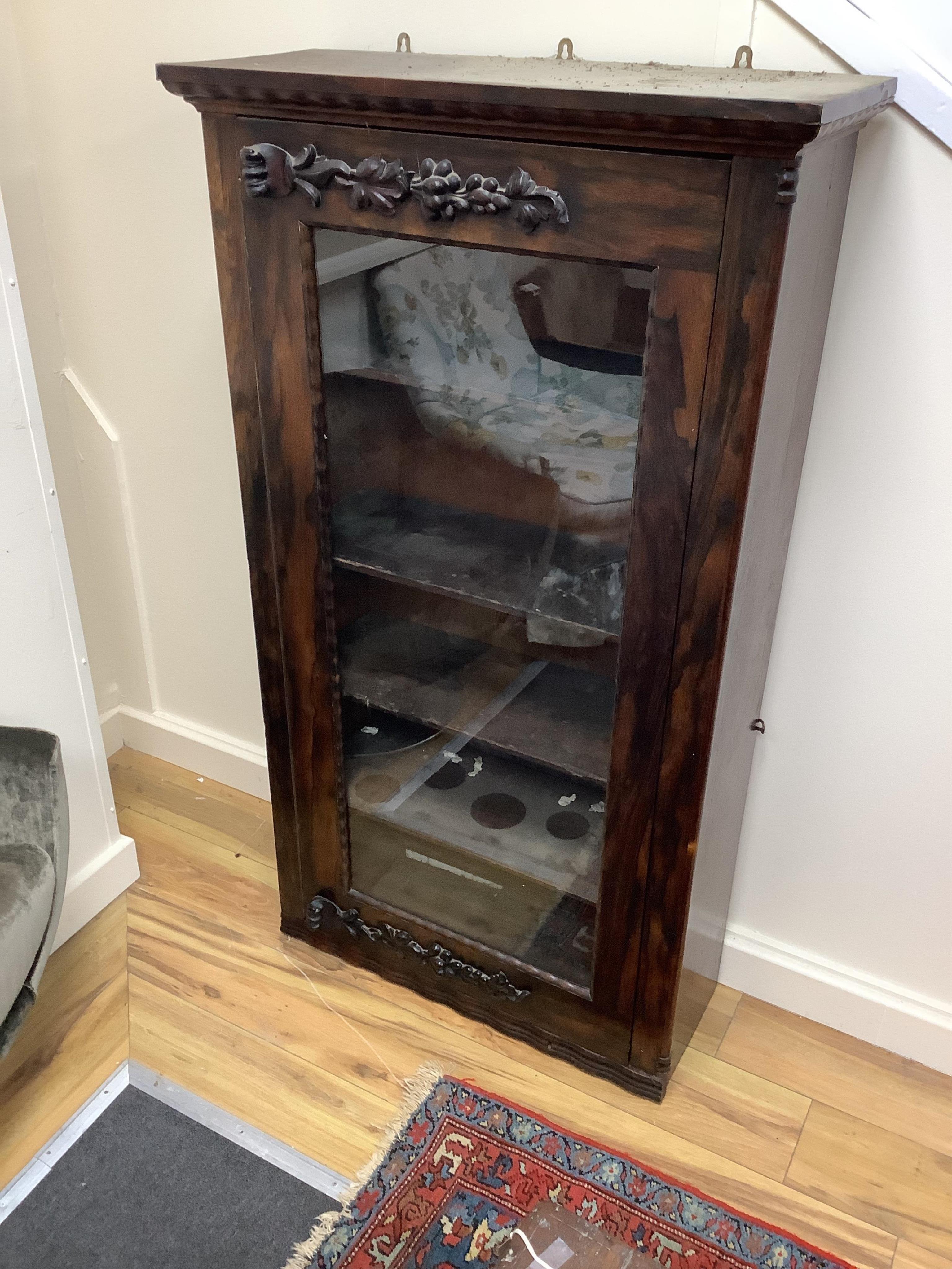 A 19th century Ceylonese rosewood hanging wall cabinet, width 76cm, depth 30cm, height 137cm. Condition - fair